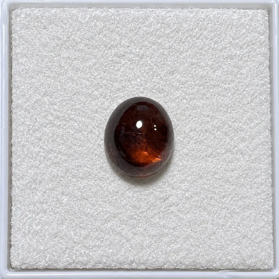 Andradit-Granat oval Cabochon 2,69t gelbbraun Namibia — Aufnahme 1
