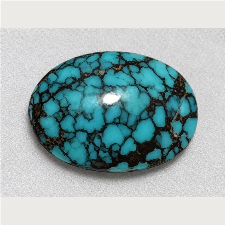 Türkis Cabochon oval 16,16ct schwarz/blau, Iran