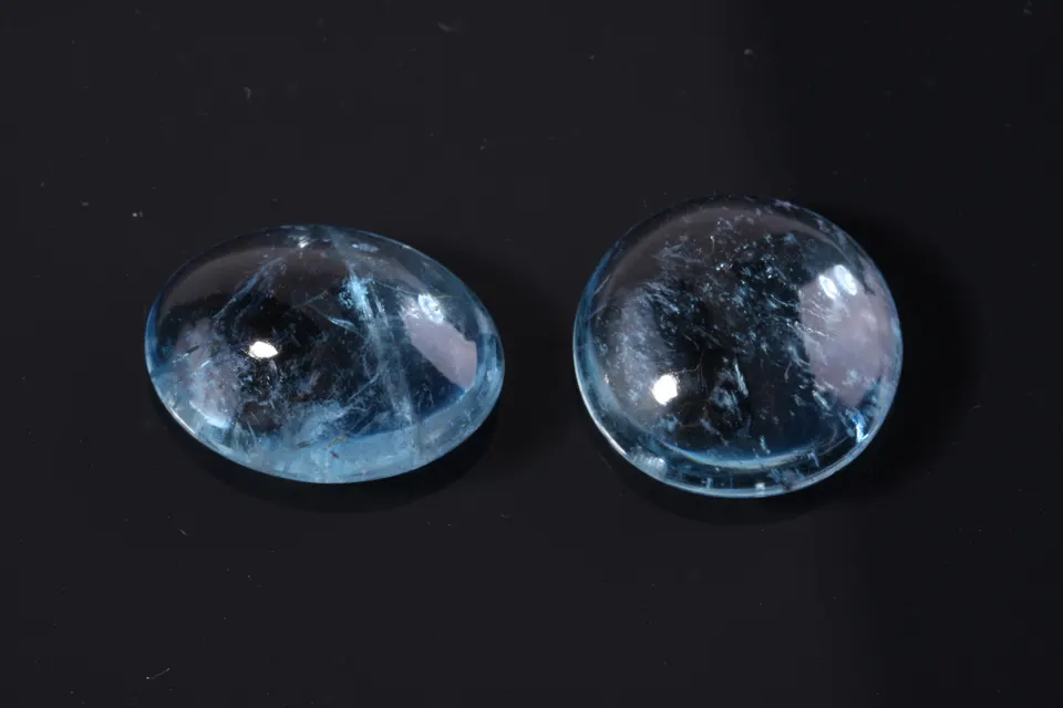Aquamarin Pärchen, med.blue, oval Cabochon, 16,60ct