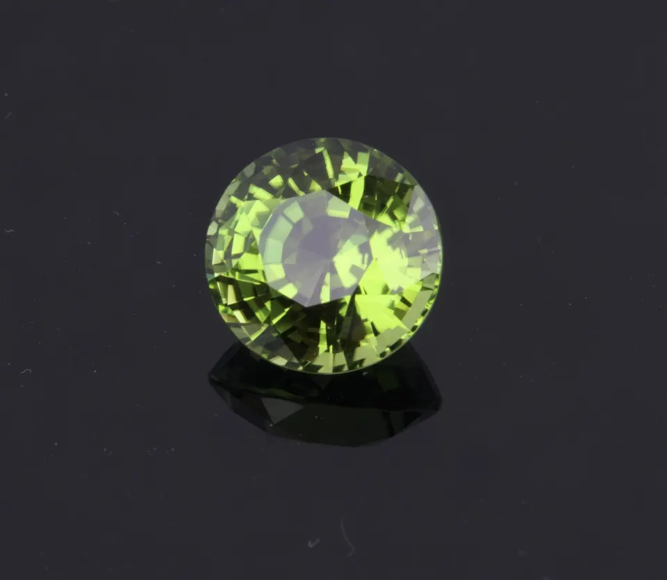 Peridot (Burma) rund mixed cut, 7,54ct, apfelgrün
