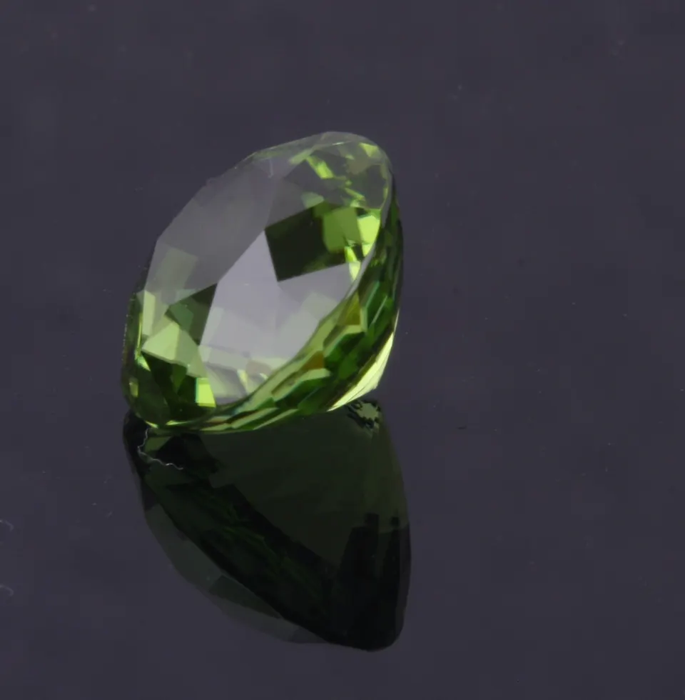 Peridot (Burma) rund mixed cut, 7,54ct, apfelgrün